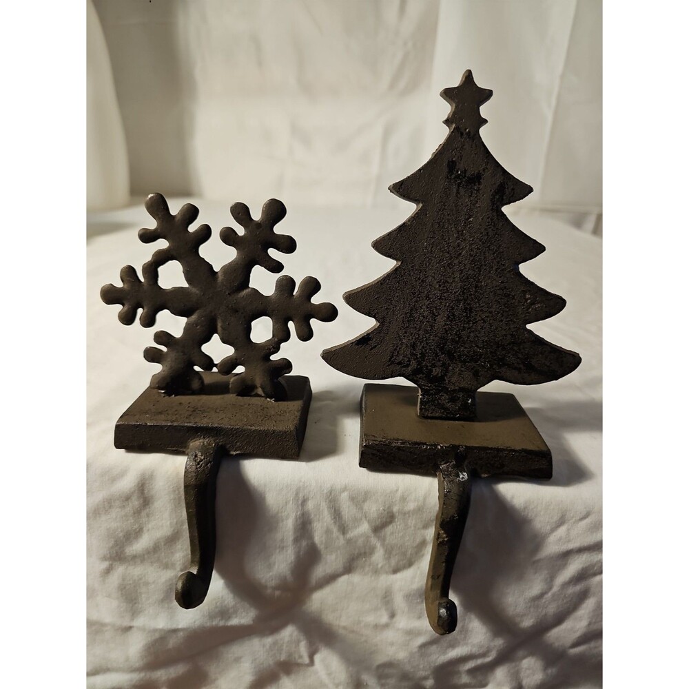 Vintage Set Of 2 Cast Iron Stocking Holders Snowflake and Christmas Tree